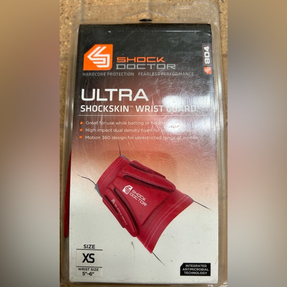Shock Doctor ultra shockskin wrist guard.             Size: XS  Color: Red